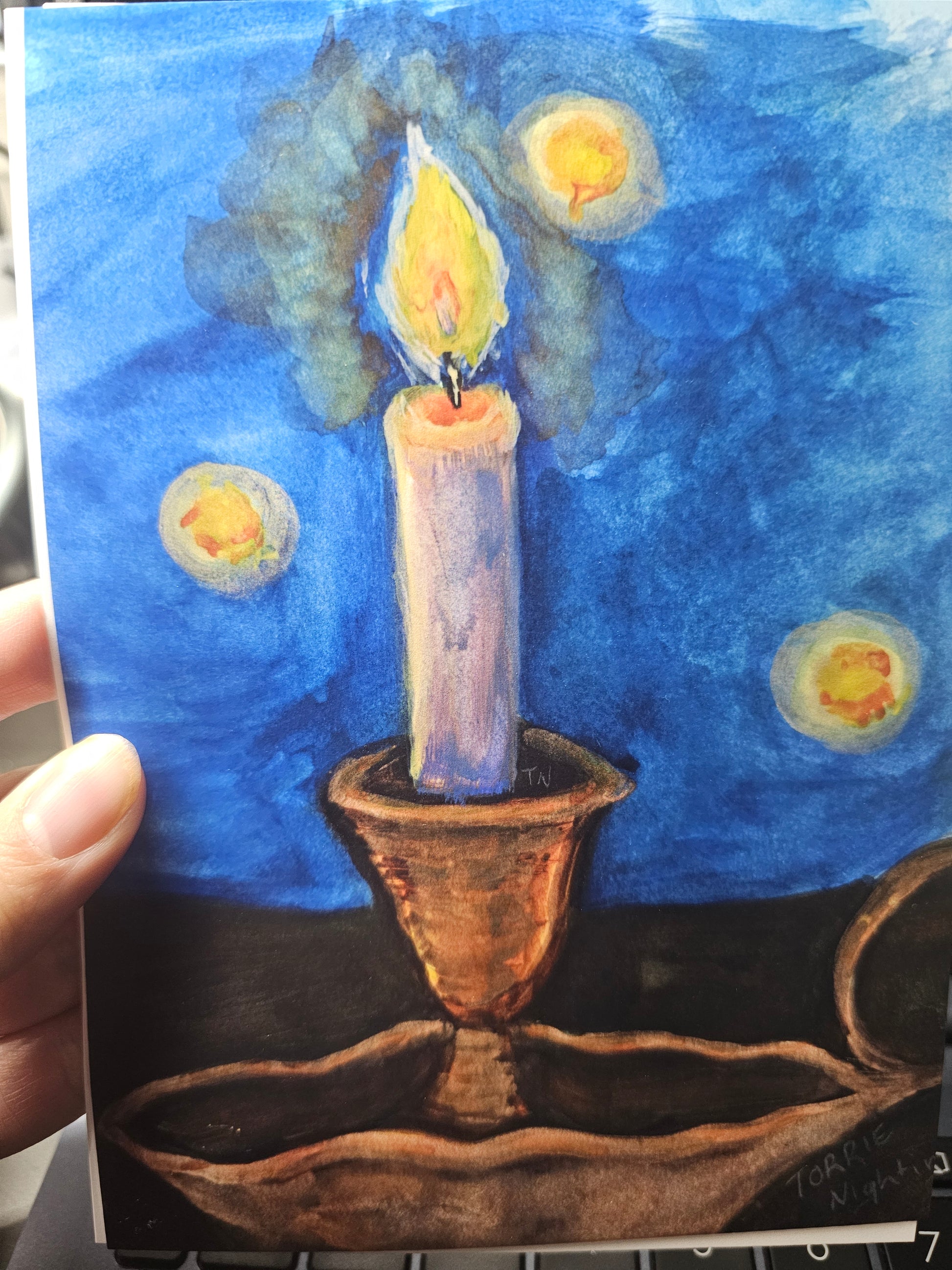 Artistic depiction of a candle with stars in the background, watercolor style